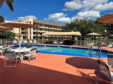 GREAT AND HIGHLY SOUGHT AFTER GROUND FLOOR 2/2 UNIT! ALL TILES on Sunrise Lakes Phase IV Golf Course in Florida - for sale on GolfHomes.com, golf home, golf lot