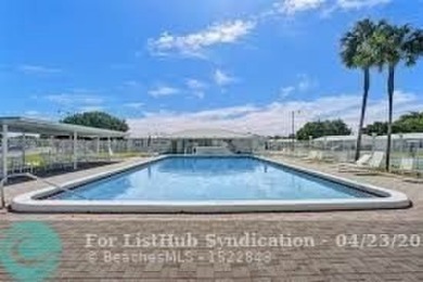 Larger model home in the community of Leisureville. This on Leisureville Community Association in Florida - for sale on GolfHomes.com, golf home, golf lot