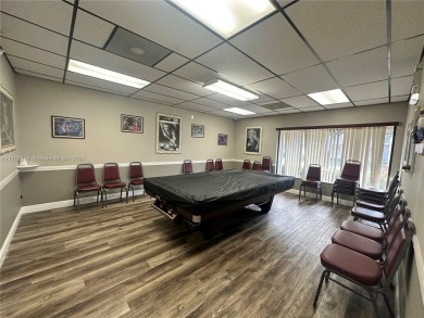 GREAT AND HIGHLY SOUGHT AFTER GROUND FLOOR 2/2 UNIT! ALL TILES on Sunrise Lakes Phase IV Golf Course in Florida - for sale on GolfHomes.com, golf home, golf lot