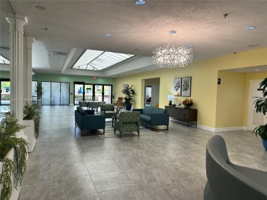 GREAT AND HIGHLY SOUGHT AFTER GROUND FLOOR 2/2 UNIT! ALL TILES on Sunrise Lakes Phase IV Golf Course in Florida - for sale on GolfHomes.com, golf home, golf lot