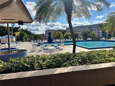 GREAT AND HIGHLY SOUGHT AFTER GROUND FLOOR 2/2 UNIT! ALL TILES on Sunrise Lakes Phase IV Golf Course in Florida - for sale on GolfHomes.com, golf home, golf lot