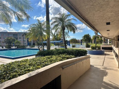 GREAT AND HIGHLY SOUGHT AFTER GROUND FLOOR 2/2 UNIT! ALL TILES on Sunrise Lakes Phase IV Golf Course in Florida - for sale on GolfHomes.com, golf home, golf lot