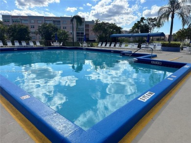 GREAT AND HIGHLY SOUGHT AFTER GROUND FLOOR 2/2 UNIT! ALL TILES on Sunrise Lakes Phase IV Golf Course in Florida - for sale on GolfHomes.com, golf home, golf lot