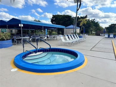 GREAT AND HIGHLY SOUGHT AFTER GROUND FLOOR 2/2 UNIT! ALL TILES on Sunrise Lakes Phase IV Golf Course in Florida - for sale on GolfHomes.com, golf home, golf lot