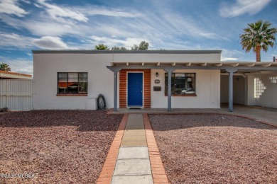 This light-filled 2-bedroom, 1-bathroom home offers stunning on Quail Creek Country Club  in Arizona - for sale on GolfHomes.com, golf home, golf lot