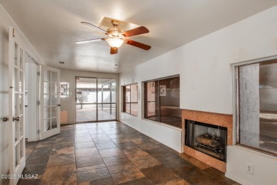 This light-filled 2-bedroom, 1-bathroom home offers stunning on Quail Creek Country Club  in Arizona - for sale on GolfHomes.com, golf home, golf lot