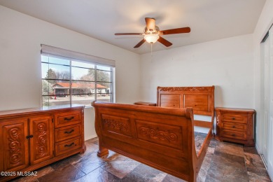 This light-filled 2-bedroom, 1-bathroom home offers stunning on Quail Creek Country Club  in Arizona - for sale on GolfHomes.com, golf home, golf lot