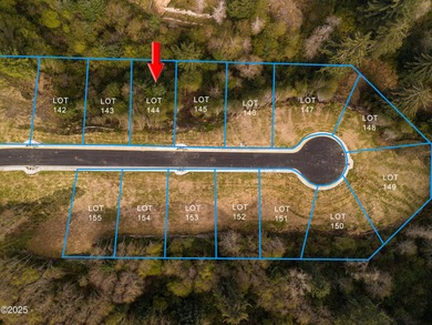 An excellent opportunity to purchase a lot with forested views on Chinook Winds Golf Resort in Oregon - for sale on GolfHomes.com, golf home, golf lot