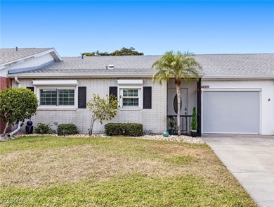 Enjoy golf course views from your spacious lanai! This inviting on Myerlee Country Club in Florida - for sale on GolfHomes.com, golf home, golf lot