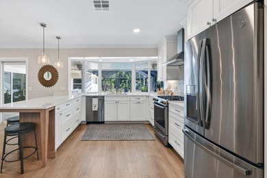 This immaculate 3 BR, 3 BA pool-home  has recently undergone an on Tequesta Country Club in Florida - for sale on GolfHomes.com, golf home, golf lot