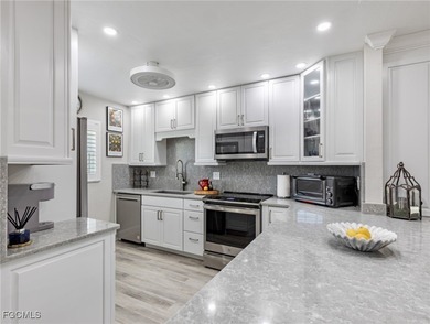 Enjoy golf course views from your spacious lanai! This inviting on Myerlee Country Club in Florida - for sale on GolfHomes.com, golf home, golf lot