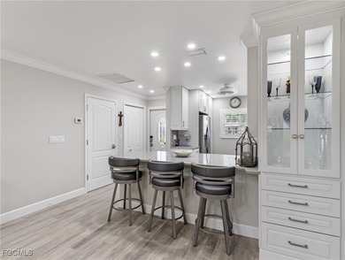 Enjoy golf course views from your spacious lanai! This inviting on Myerlee Country Club in Florida - for sale on GolfHomes.com, golf home, golf lot