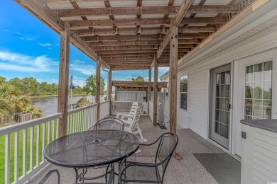 Waterfront Living with Private Dock - Your Coastal Oasis Awaits! on Barefoot Resort and Golf Club  in South Carolina - for sale on GolfHomes.com, golf home, golf lot