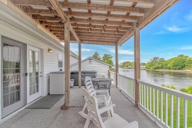Waterfront Living with Private Dock - Your Coastal Oasis Awaits! on Barefoot Resort and Golf Club  in South Carolina - for sale on GolfHomes.com, golf home, golf lot