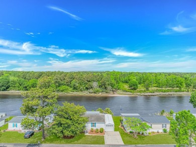 Waterfront Living with Private Dock - Your Coastal Oasis Awaits! on Barefoot Resort and Golf Club  in South Carolina - for sale on GolfHomes.com, golf home, golf lot