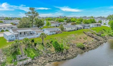 Waterfront Living with Private Dock - Your Coastal Oasis Awaits! on Barefoot Resort and Golf Club  in South Carolina - for sale on GolfHomes.com, golf home, golf lot
