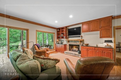 Discover the idyllic mountain charm of this four-bedroom on Sapphire National Golf Club in North Carolina - for sale on GolfHomes.com, golf home, golf lot