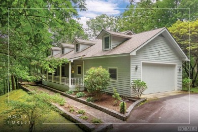 Discover the idyllic mountain charm of this four-bedroom on Sapphire National Golf Club in North Carolina - for sale on GolfHomes.com, golf home, golf lot