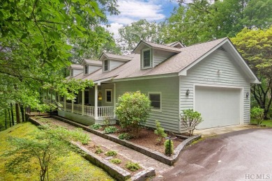 Discover the idyllic mountain charm of this four-bedroom on Sapphire National Golf Club in North Carolina - for sale on GolfHomes.com, golf home, golf lot