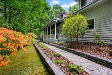 Discover the idyllic mountain charm of this four-bedroom on Sapphire National Golf Club in North Carolina - for sale on GolfHomes.com, golf home, golf lot