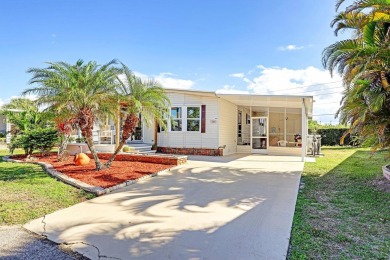 This 1983 Jacobsen Imperial home is situated on a perimeter lot on Maple Leaf Golf and Country Club in Florida - for sale on GolfHomes.com, golf home, golf lot