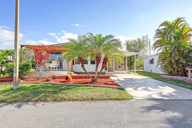 This 1983 Jacobsen Imperial home is situated on a perimeter lot on Maple Leaf Golf and Country Club in Florida - for sale on GolfHomes.com, golf home, golf lot