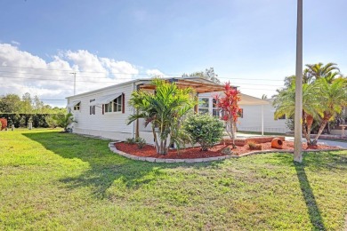 This 1983 Jacobsen Imperial home is situated on a perimeter lot on Maple Leaf Golf and Country Club in Florida - for sale on GolfHomes.com, golf home, golf lot
