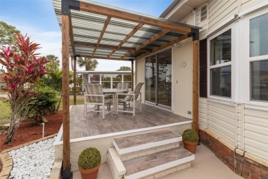This 1983 Jacobsen Imperial home is situated on a perimeter lot on Maple Leaf Golf and Country Club in Florida - for sale on GolfHomes.com, golf home, golf lot