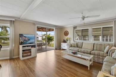 This 1983 Jacobsen Imperial home is situated on a perimeter lot on Maple Leaf Golf and Country Club in Florida - for sale on GolfHomes.com, golf home, golf lot
