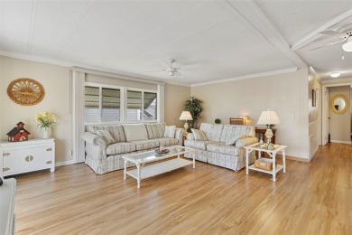 This 1983 Jacobsen Imperial home is situated on a perimeter lot on Maple Leaf Golf and Country Club in Florida - for sale on GolfHomes.com, golf home, golf lot