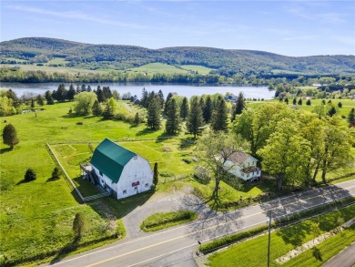 Nestled on Dryden Lake, just outside the village of Dryden on Dryden Lake Golf Club in New York - for sale on GolfHomes.com, golf home, golf lot