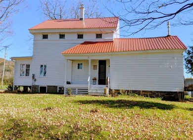 Nestled on Dryden Lake, just outside the village of Dryden on Dryden Lake Golf Club in New York - for sale on GolfHomes.com, golf home, golf lot