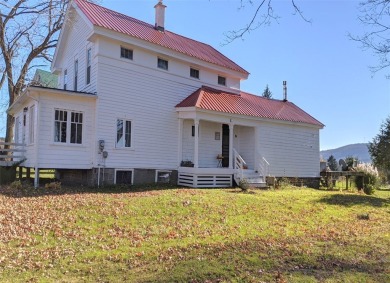 Nestled on Dryden Lake, just outside the village of Dryden on Dryden Lake Golf Club in New York - for sale on GolfHomes.com, golf home, golf lot