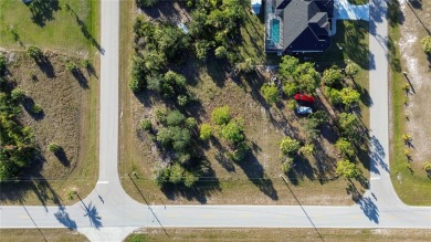 This cleared lot in South Gulf Cove is surrounded by beautiful on Rotonda Golf and Country Club - Long Marsh  in Florida - for sale on GolfHomes.com, golf home, golf lot