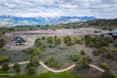 This spectacular homesite is located in one of the premier areas on Red Ledges Golf Club in Utah - for sale on GolfHomes.com, golf home, golf lot