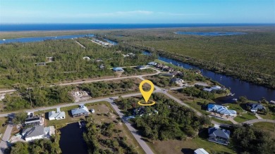 This cleared lot in South Gulf Cove is surrounded by beautiful on Rotonda Golf and Country Club - Long Marsh  in Florida - for sale on GolfHomes.com, golf home, golf lot