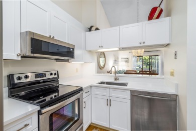 Nestled in Eaton Village, this second-floor 2-bed, 2-bath condo on Ocean Edge Resort and Golf Club in Massachusetts - for sale on GolfHomes.com, golf home, golf lot