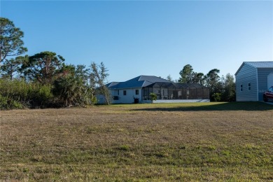 This cleared lot in South Gulf Cove is surrounded by beautiful on Rotonda Golf and Country Club - Long Marsh  in Florida - for sale on GolfHomes.com, golf home, golf lot