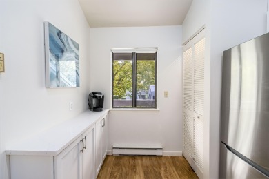 Nestled in Eaton Village, this second-floor 2-bed, 2-bath condo on Ocean Edge Resort and Golf Club in Massachusetts - for sale on GolfHomes.com, golf home, golf lot