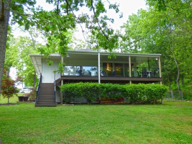 Built for comfort and ease of living, this home on Lake Navajo on Cherokee Village North Course in Arkansas - for sale on GolfHomes.com, golf home, golf lot