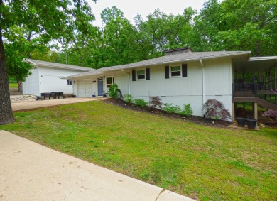Built for comfort and ease of living, this home on Lake Navajo on Cherokee Village North Course in Arkansas - for sale on GolfHomes.com, golf home, golf lot