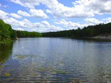 Built for comfort and ease of living, this home on Lake Navajo on Cherokee Village North Course in Arkansas - for sale on GolfHomes.com, golf home, golf lot