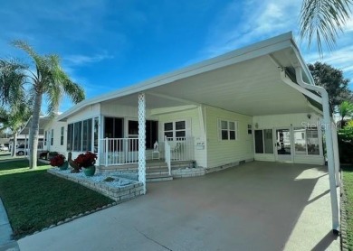 This beautifully furnished and extensively renovated two-bedroom on Fairway Village Golf Course in Florida - for sale on GolfHomes.com, golf home, golf lot