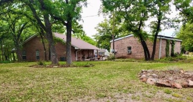 Amon G Carter Lake LAKEFRONT 1.85 Acre lot on a corner with a on Twisted Oaks Golf Club in Texas - for sale on GolfHomes.com, golf home, golf lot