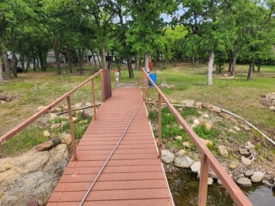 Amon G Carter Lake LAKEFRONT 1.85 Acre lot on a corner with a on Twisted Oaks Golf Club in Texas - for sale on GolfHomes.com, golf home, golf lot