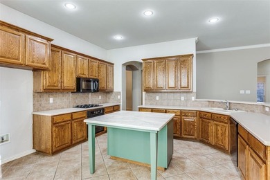 Beautifully maintained one-story home offering 4 bedrooms, 2 on Walnut Creek Country Club in Texas - for sale on GolfHomes.com, golf home, golf lot