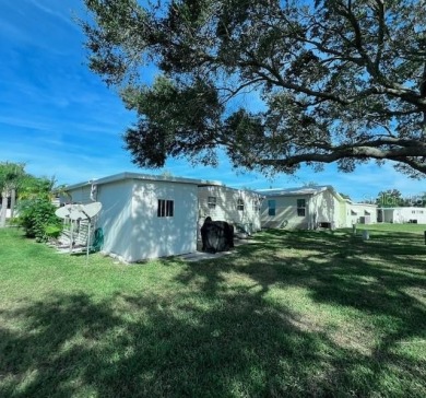 This beautifully furnished and extensively renovated two-bedroom on Fairway Village Golf Course in Florida - for sale on GolfHomes.com, golf home, golf lot