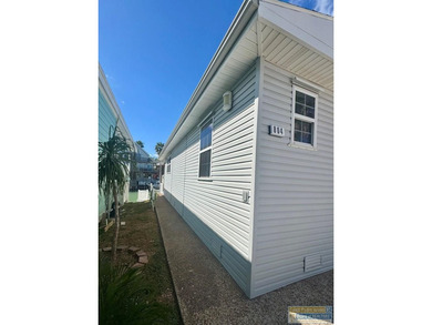 Your Coastal Retreat awaits! Waterfront 2bd/2ba move-in ready on Long Island Golf Course in Texas - for sale on GolfHomes.com, golf home, golf lot