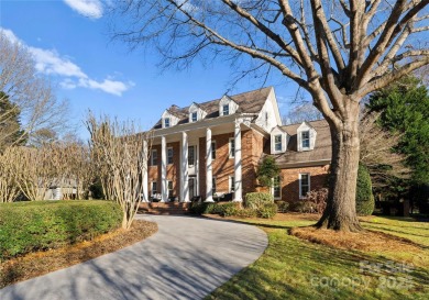 This distinctive home offers six bedrooms and five and a half on Providence Country Club in North Carolina - for sale on GolfHomes.com, golf home, golf lot