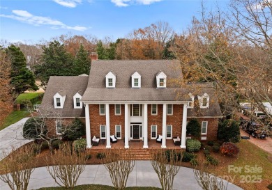 This distinctive home offers six bedrooms and five and a half on Providence Country Club in North Carolina - for sale on GolfHomes.com, golf home, golf lot